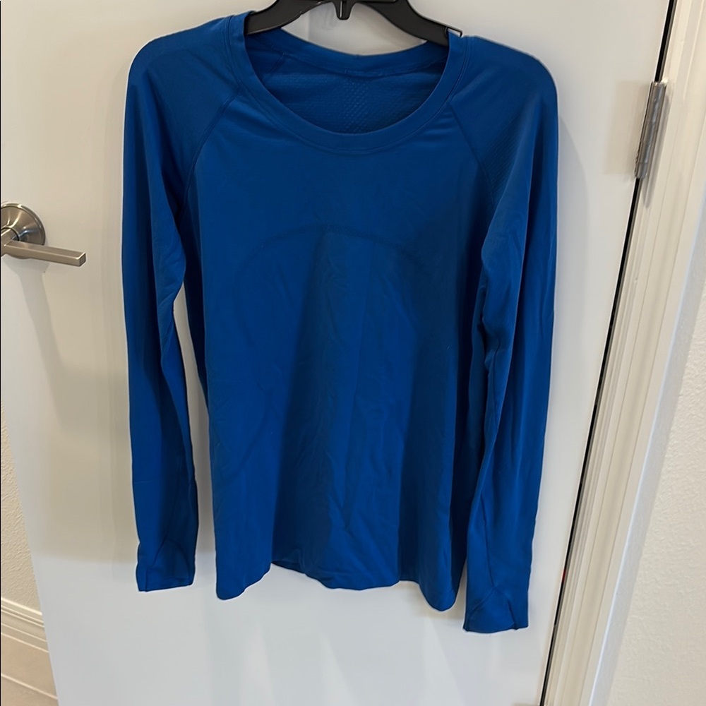 Swiftly Tech Long-Sleeve Shirt 2.0
Waist Length